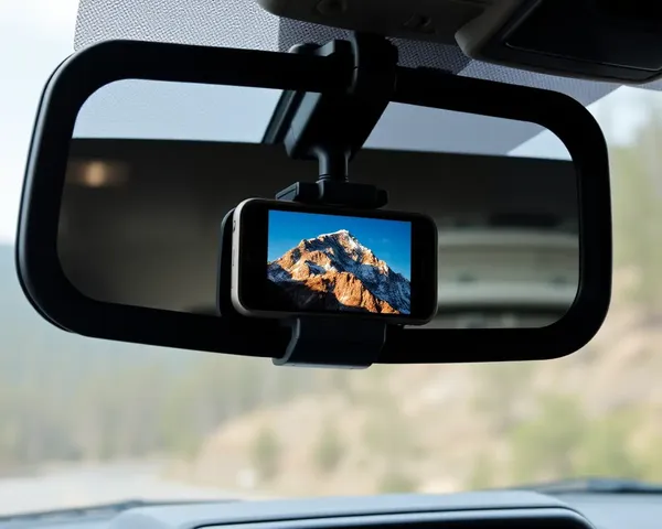 Dramatic Mountain Peak iPhone Wallpaper on Jeep Patriot Rearview