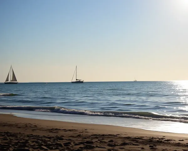 Good Morning Image Shukrawar: Serene Beach Scene with Calm Ocean and Sailboats