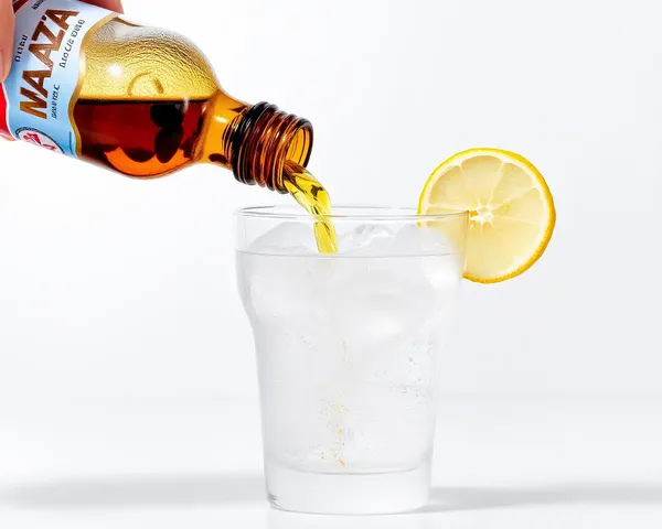 Maaza Bottle Poured into Glass with Lemon