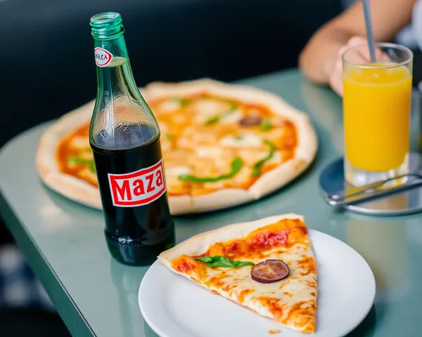 Maaza Bottle with Pizza and Juice Nearby