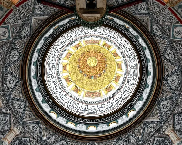 Ornate Masjid Minar Interior with Tilework and Calligraphy