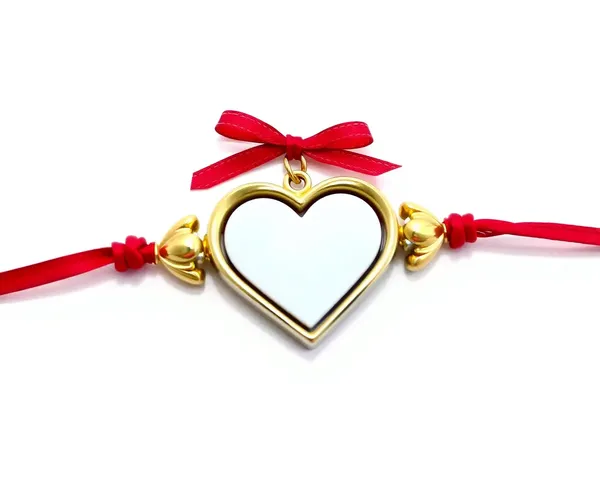 Raksha Bandhan Text PNG: Heart-Shaped Rakhi Pendant