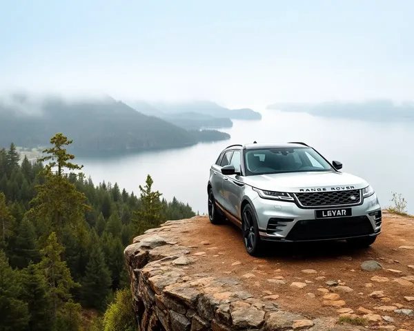 Range Rover Velar Parked on Cliff Overlooking Serene Lake