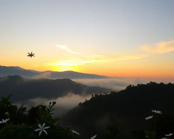 Serene Mountain Range with Poo Malai Flowers in Morning Mist