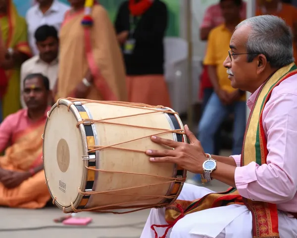 Skilled Musician Plays Traditional Indian Dholak Drum at Festival