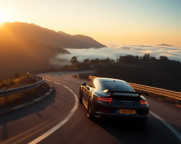 Swift Car Rages Through Winding Mountain Road Sunset