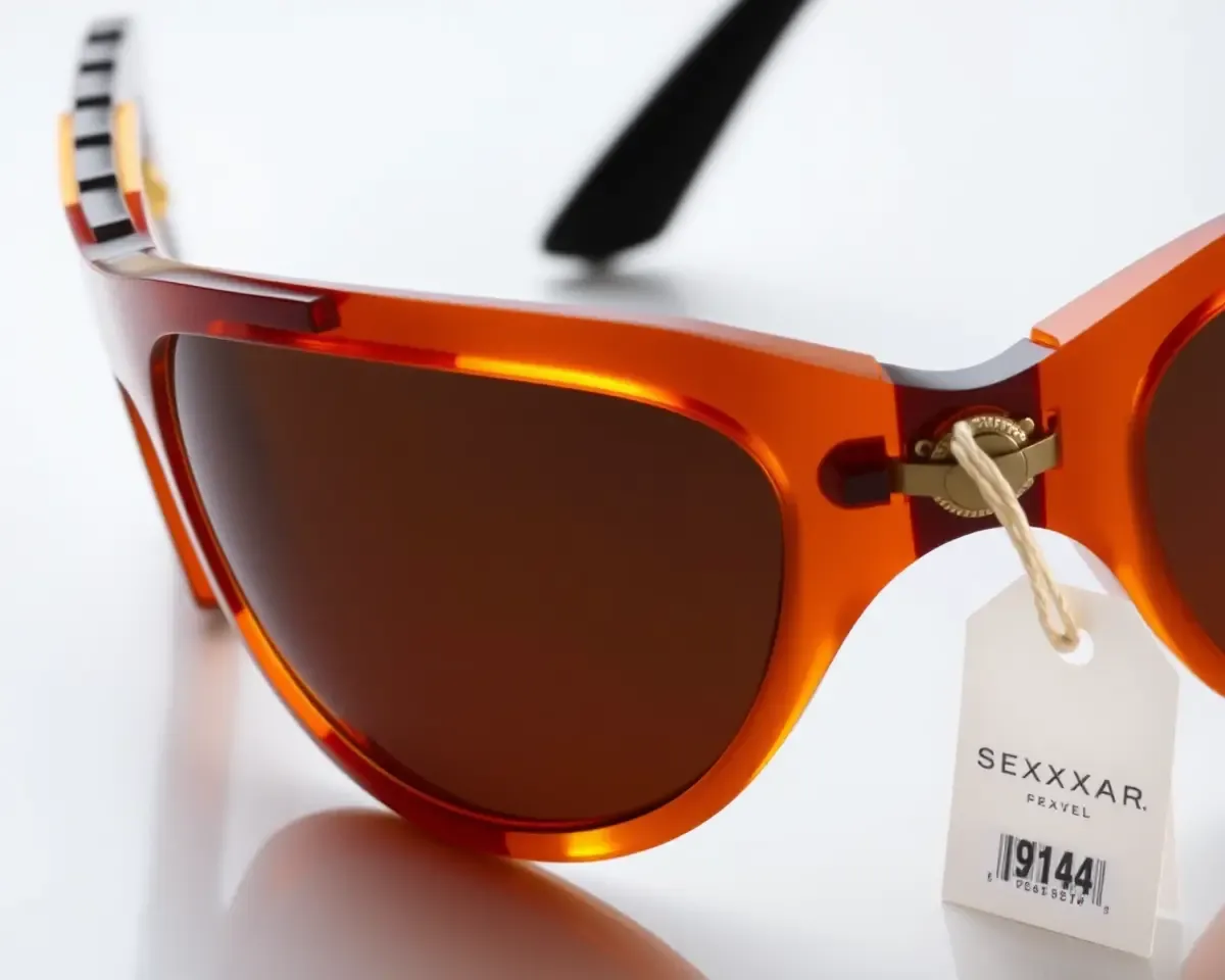 Close-Up of Sexxxy Sunglasses with Price Tag and Brand Name